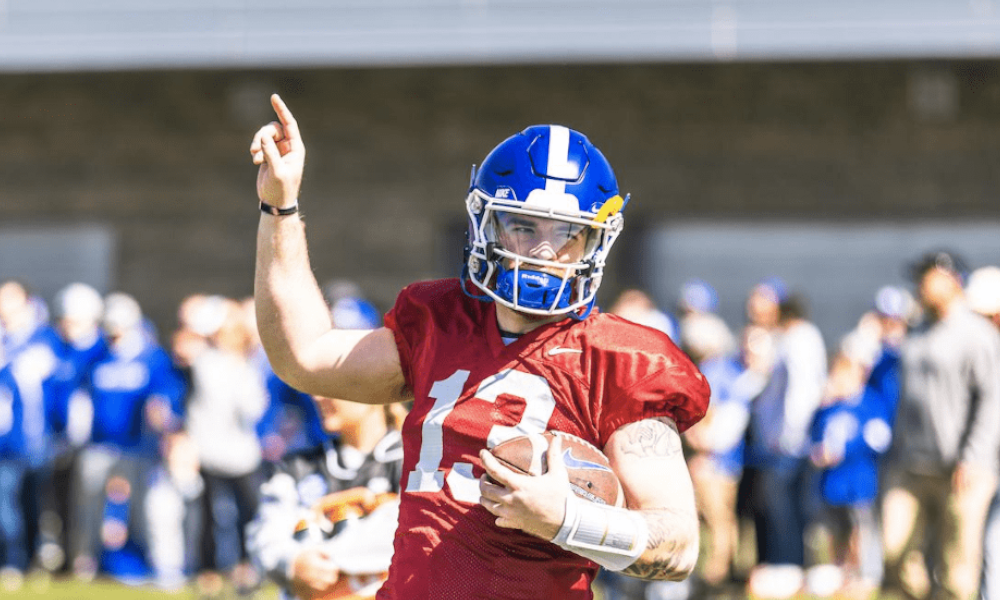 Kentucky quarterback Devin Leary points to the sky during practice.