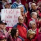 An Indiana fan holds a sign referencing Purdue's men's basketball team during the first round of the NCAA women's tournament at Simon Skjodt Assembly Hall.