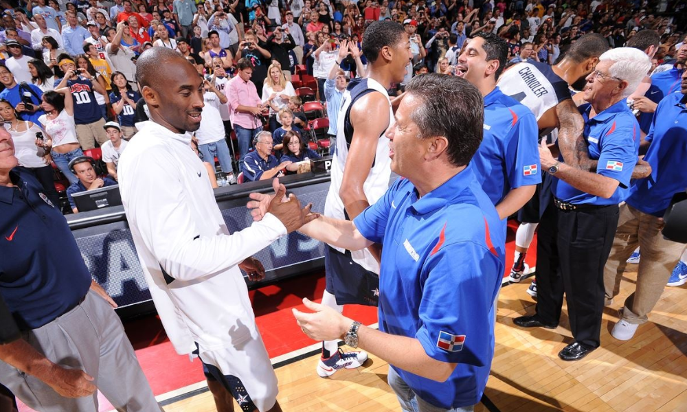 John Calipari and Kobe Bryant shake hands in FIBA international play.