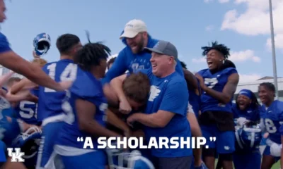 Kentucky Football walk-on Cole Lanter presented with a scholarship.