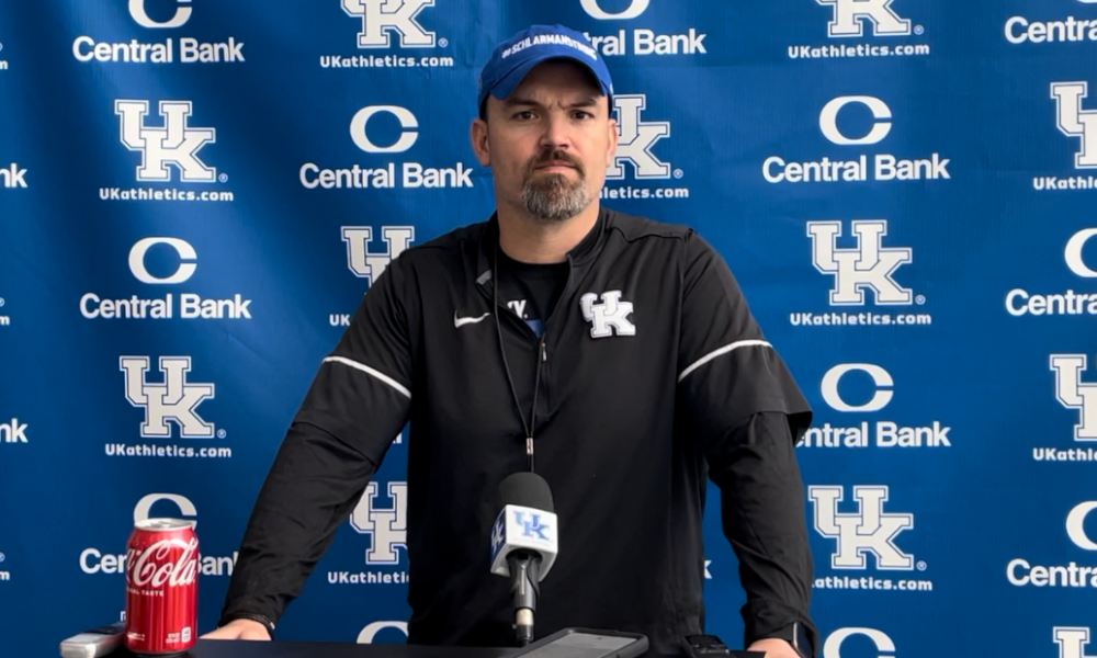 Defensive coordinator Brad White talking to the media after Kentucky football practice.