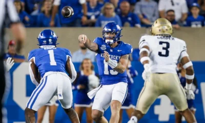 Kentucky Wildcats quarterback Devin Leary (13) completes his first pass of the game to a waiting Kentucky Wildcats running back Ray Davis (1) for a big gain as the Cats beat Akron 35-3 in Saturday at Kroger Field in Lexington