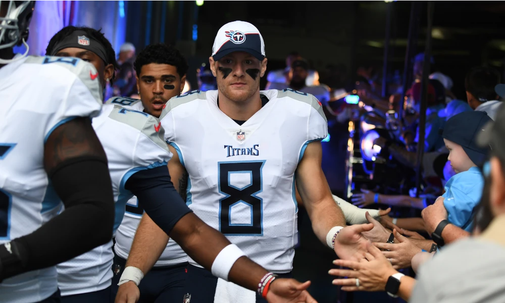 ennessee Titans quarterback Will Levis (8) walks to the field before the game against the Los Angeles Chargers at Nissan Stadium.