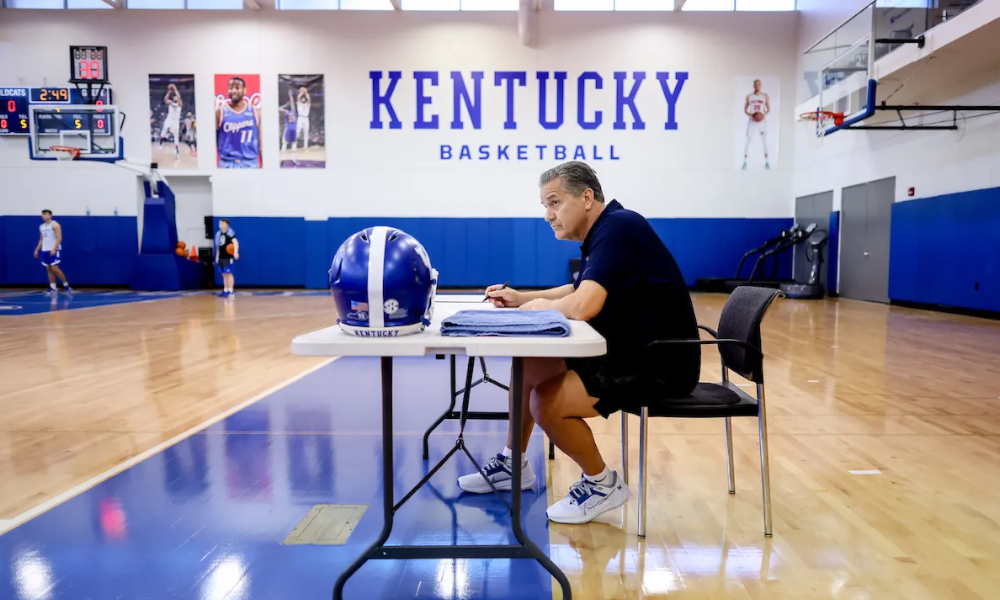 John Calipari observes Kentucky basketball practice.