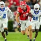 Georgia Bulldogs tight end Brock Bowers (19) runs after a catch against the Kentucky Wildcats at Sanford Stadium.