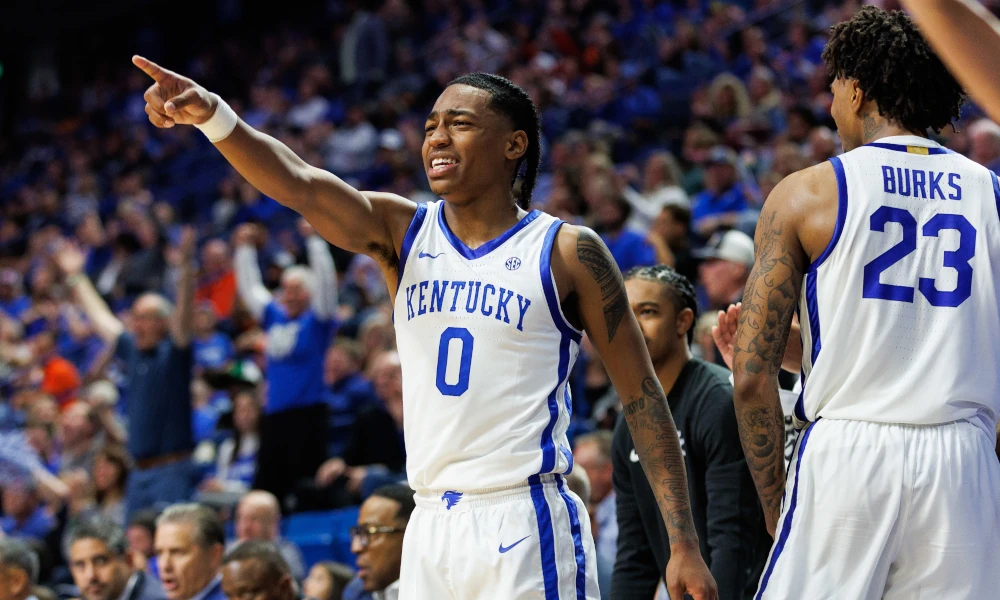 Kentucky Wildcats guard Rob Dillingham (0) celebrates a basket during the second half against the Georgetown Tigers at Rupp Arena.