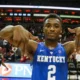 Kentucky Wildcats guard Ashton Hagans throws up L's down after beating the Louisville Cardinals at the KFC Yum Center.
