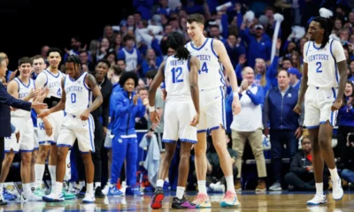 Kentucky Wildcats celebrating with Zvonimir Ivisic during his impressive debut.