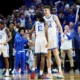 Kentucky Wildcats celebrating with Zvonimir Ivisic during his impressive debut.