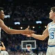 Reed Sheppard and Justin Edwards celebrating with each other at Rupp Arena.