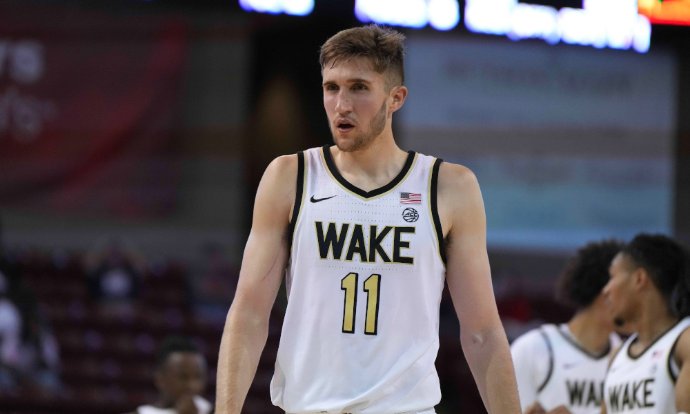 Wake Forest transfer Andrew Carr has committed to play for Mark Pope and the Kentucky Wildcats.