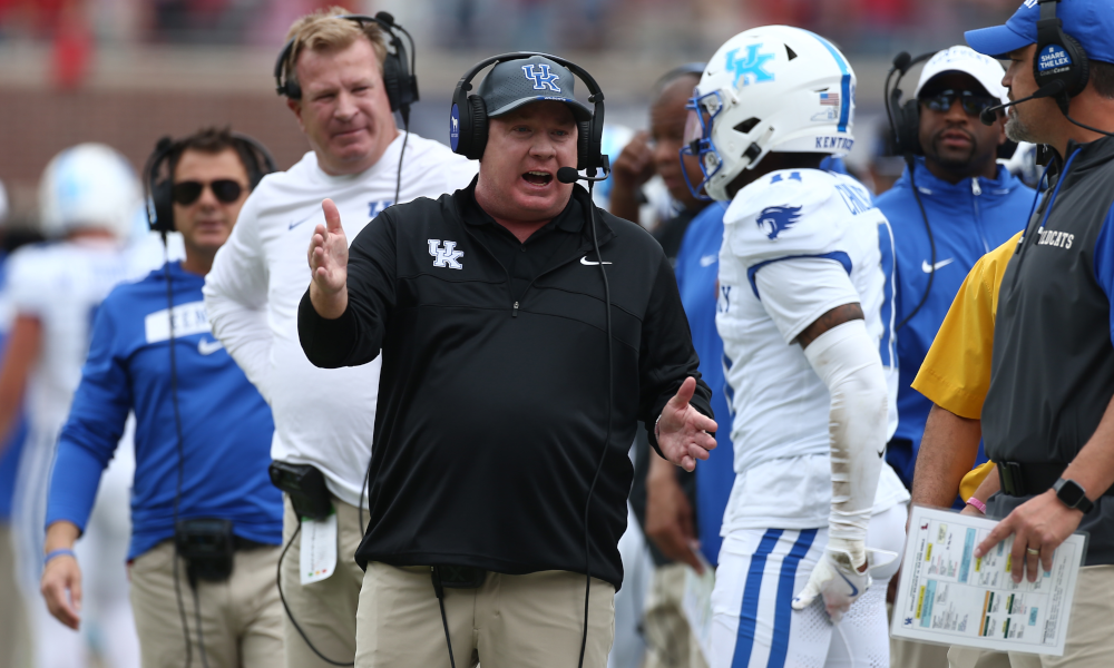 Mark Stoops jokes about himself with reporters after controversial decision to punt against top ranked Georgia.