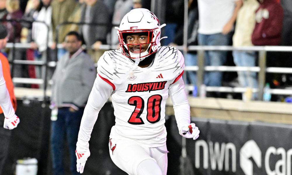 Louisville Cardinals defensive back Tayon Holloway (20) reacts to his defensive play.