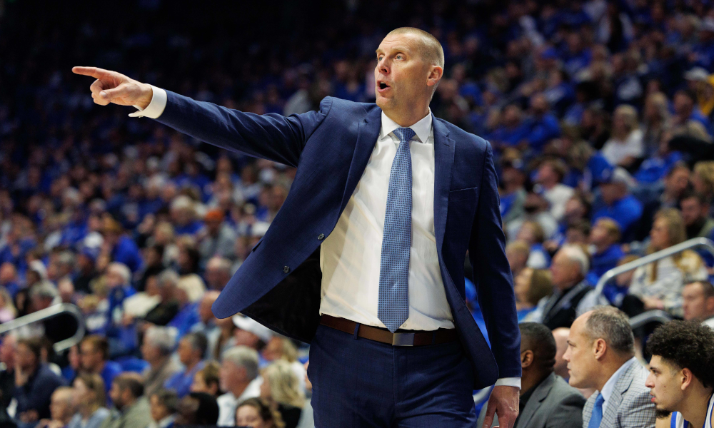 Kentucky Wildcats head coach Mark Pope directs his players.