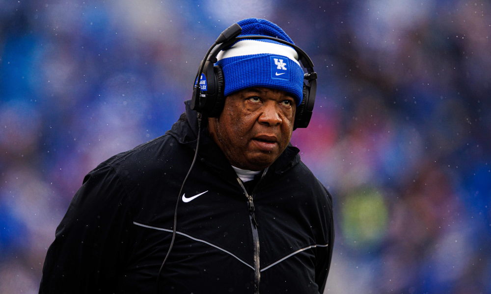 Kentucky associate head coach Vince Marrow on the sidelines at Kroger Field.