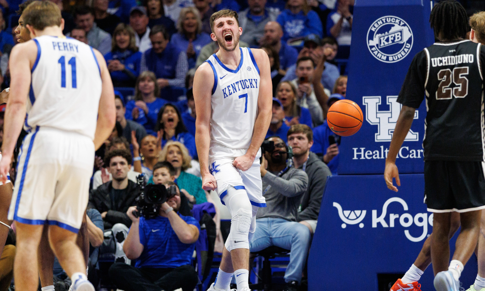 Kentucky Wildcats forward Andrew Carr (7) celebrates after making a basket.