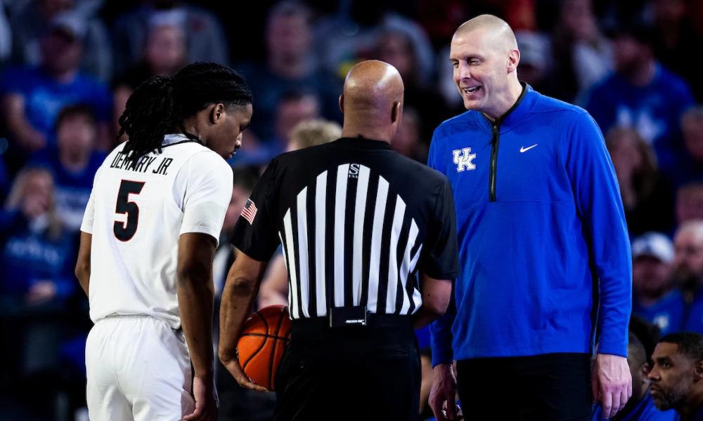 Mark Pope talking to an official during the Kentucky-Georgia game.