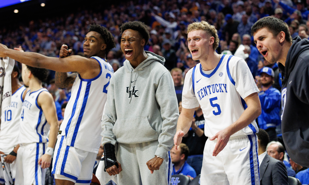 Kentucky guard Jaxson Robinson (2) celebrates from the bench.