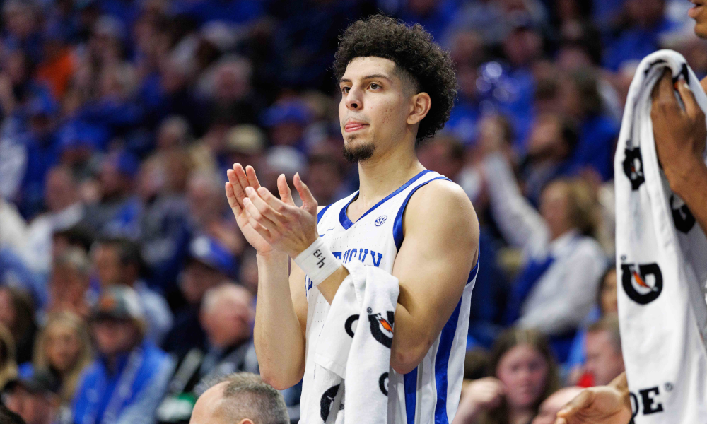 Kentucky Wildcats guard Koby Brea (4) reacts to the action from the bench in Rupp Arena.