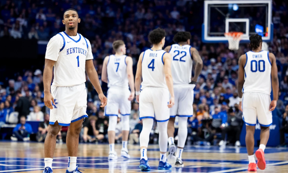 Lamont Butler and the Kentucky Wildcats on the court at Rupp Arena.