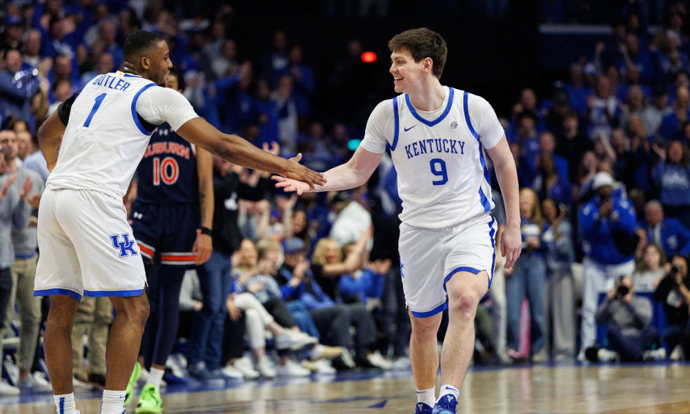 Kentucky Wildcats forward Trent Noah (9) celebrates with guard Lamont Butler (1).