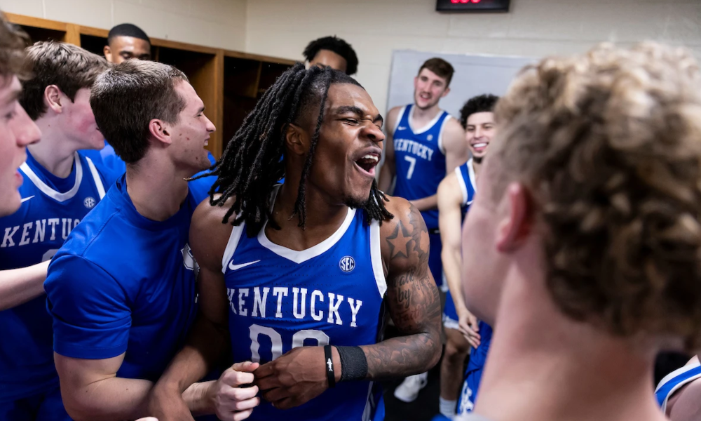 Kentucky guard Otega Oweh celebrated with team after big win.