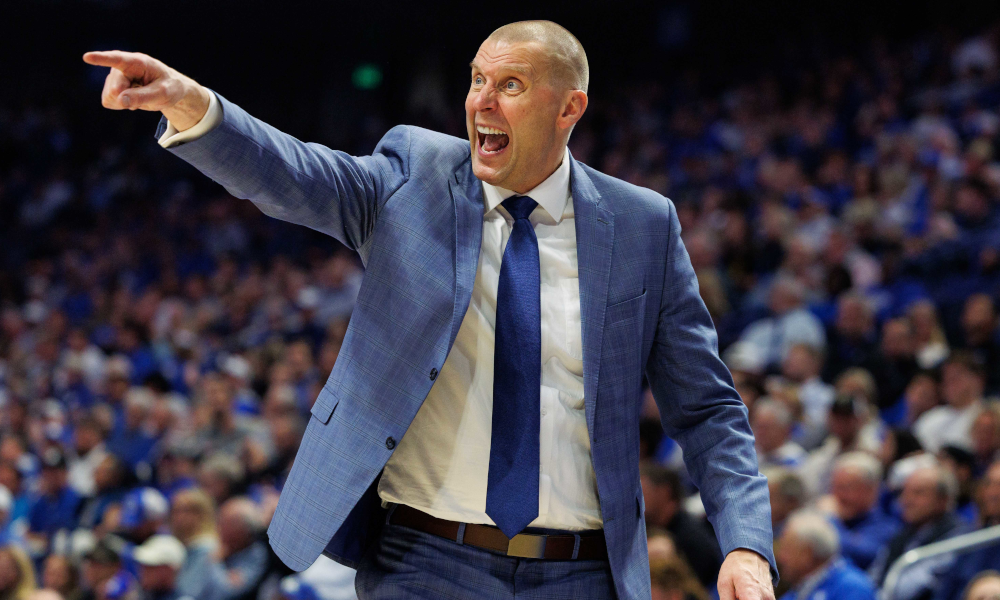 Kentucky Wildcats head coach Mark Pope yells to his players