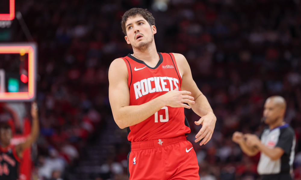 Houston Rockets guard Reed Sheppard (15) reacts after a play during the game.