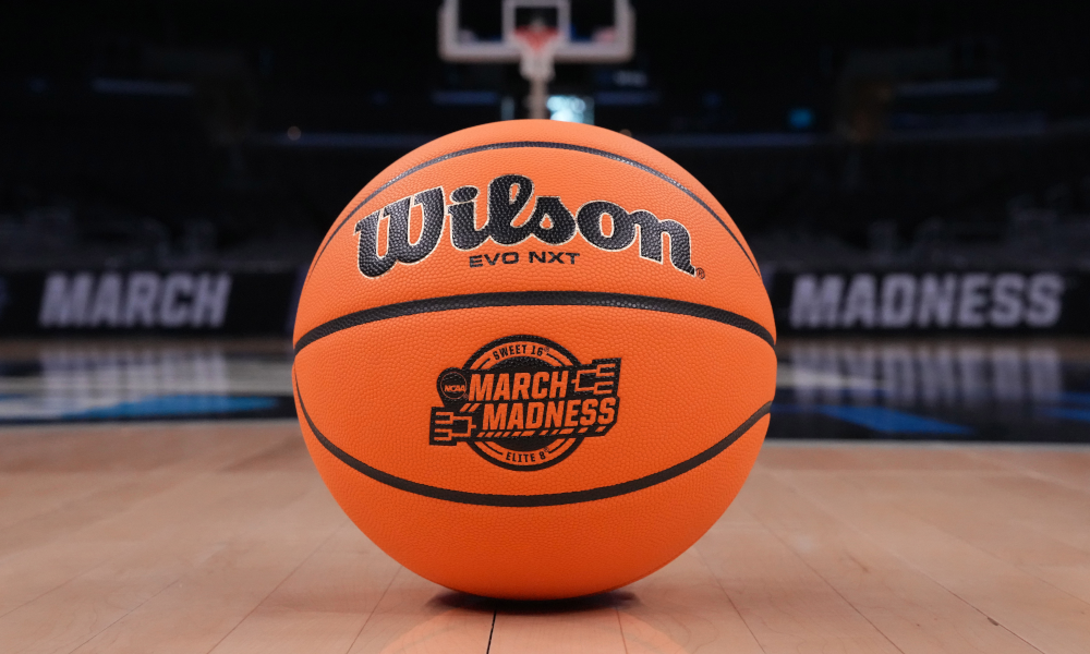 A Wilson official Evo NXT game basketball with March Madness,