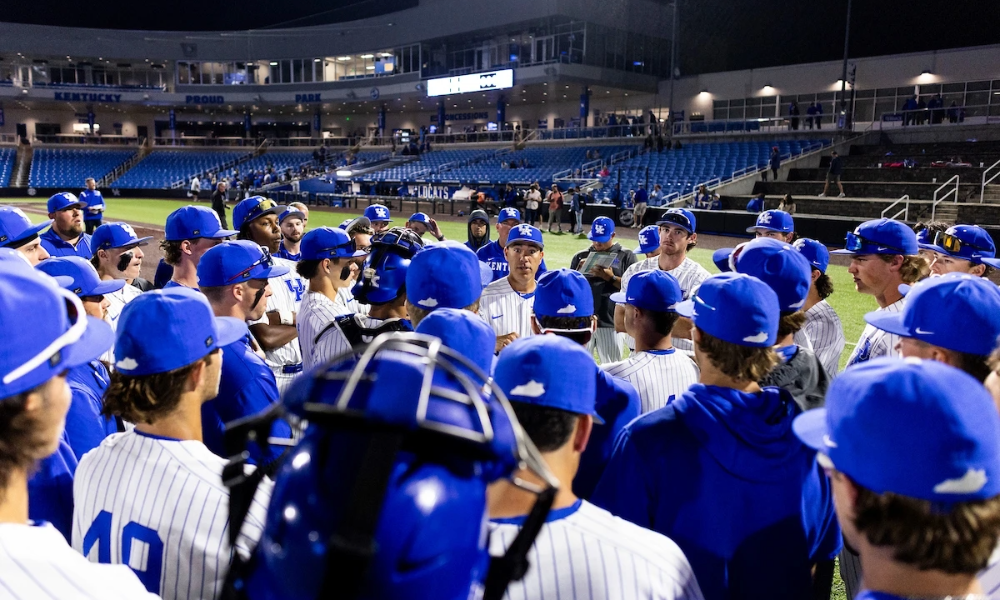 Nick Mingione talks to the team.