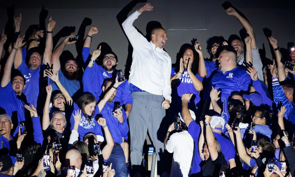 Mark Pope in a crowd of fans at Big Blue Madness